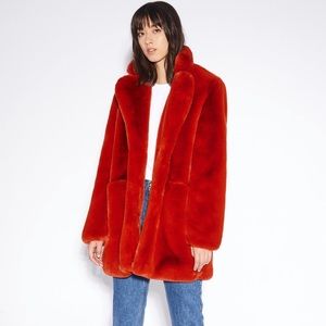 Avec les filles coat in red plush fur Cardi B